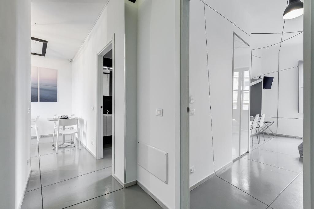 Televízia a/alebo spoločenská miestnosť v ubytovaní The Upper Suites