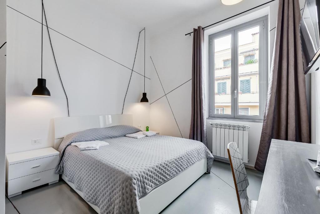 Posteľ alebo postele v izbe v ubytovaní The Upper Suites