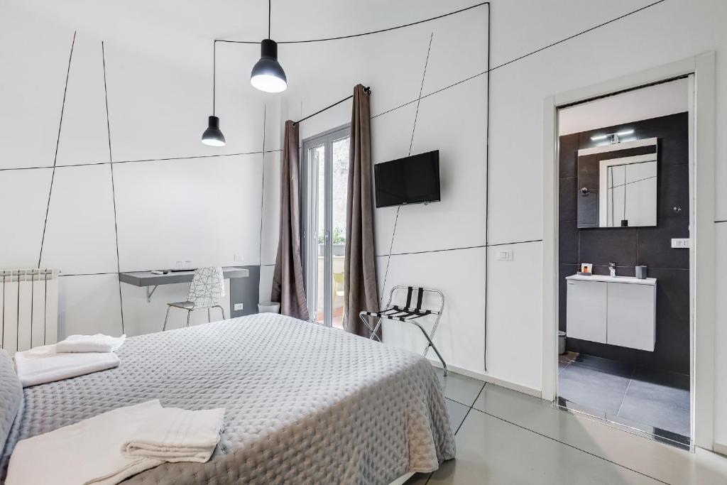 Posteľ alebo postele v izbe v ubytovaní The Upper Suites