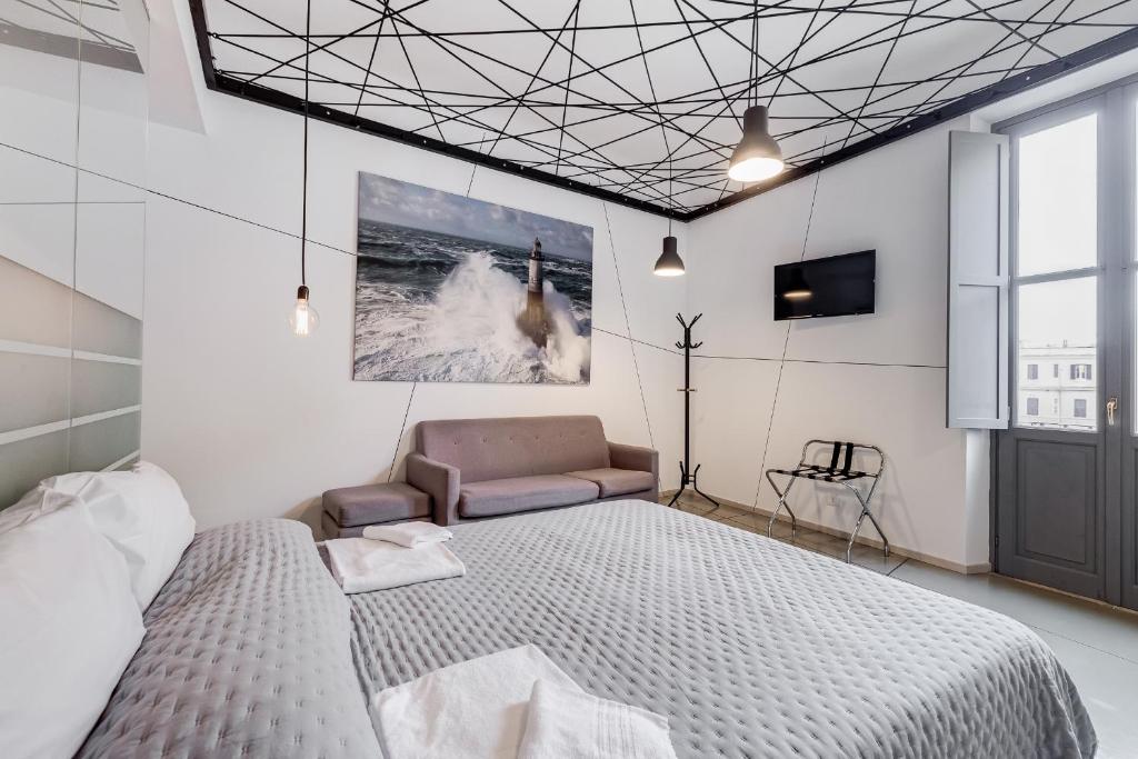 Posteľ alebo postele v izbe v ubytovaní The Upper Suites