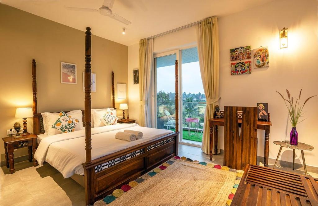 Ένα ή περισσότερα κρεβάτια σε δωμάτιο στο Green Ambit the Calissa