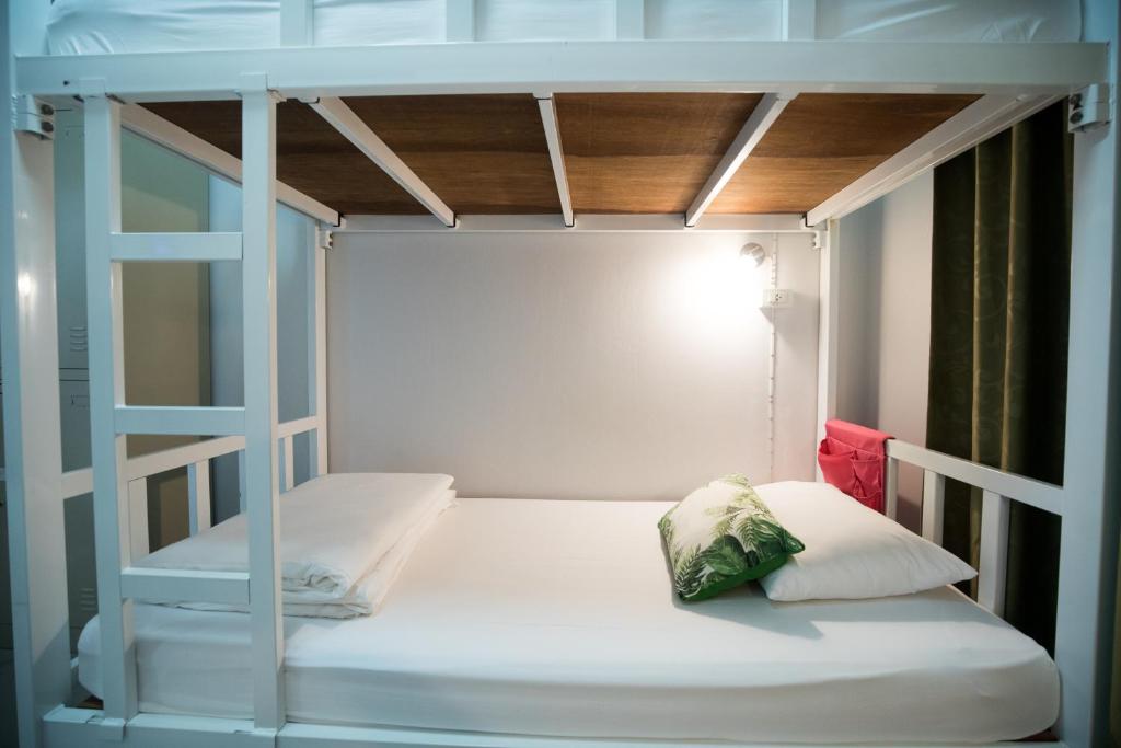 Postel nebo postele na pokoji v ubytování DKaYa Hostel
