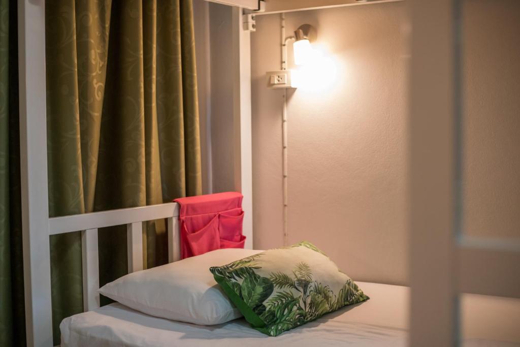 Postel nebo postele na pokoji v ubytování DKaYa Hostel