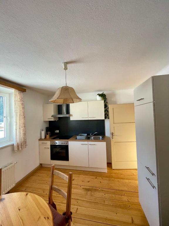 Kuchyň nebo kuchyňský kout v ubytování Hofgartnerhof