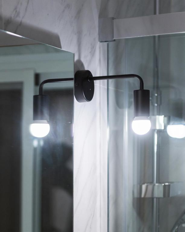A bathroom at Nordik Rooms Urban - Centro "Helsinki"