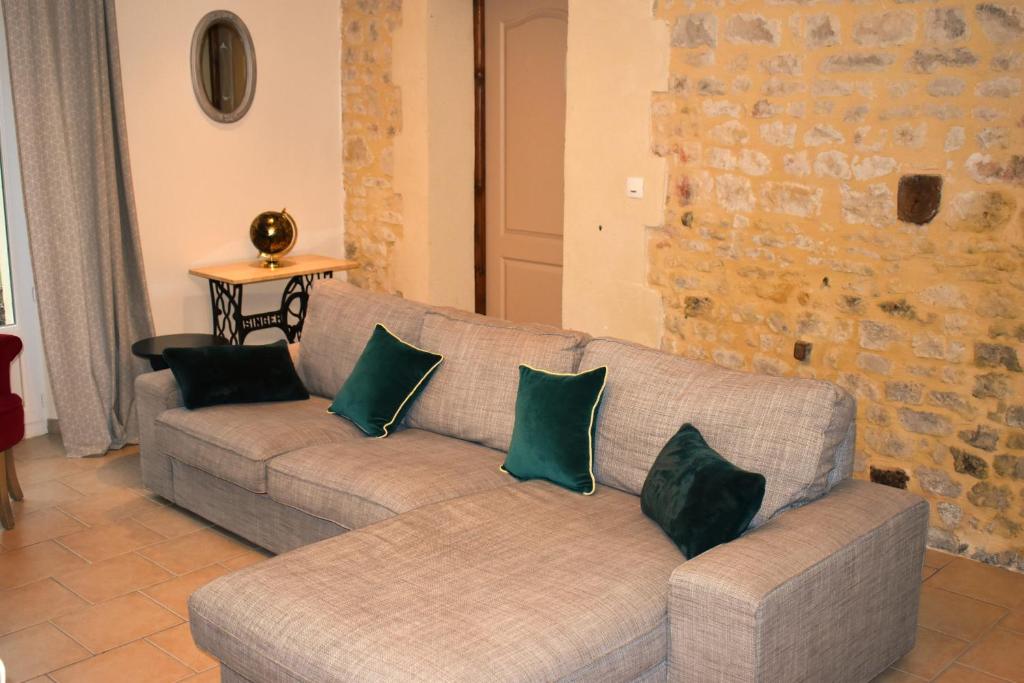 Posezení v ubytování L'Îlot Pomme Cottage