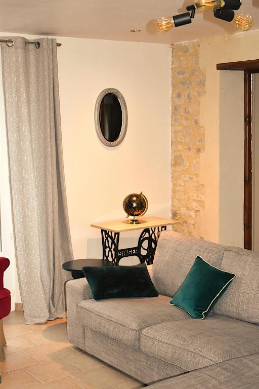 Posezení v ubytování L'Îlot Pomme Cottage