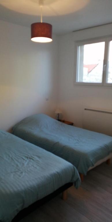 Postel nebo postele na pokoji v ubytování STUDIO-COSY