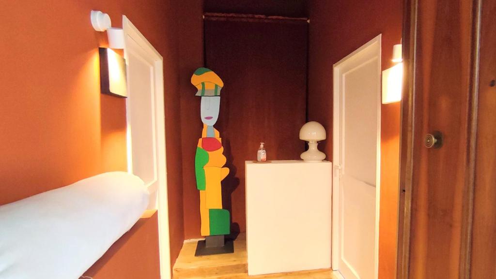 Postel nebo postele na pokoji v ubytování Matilde Rooms