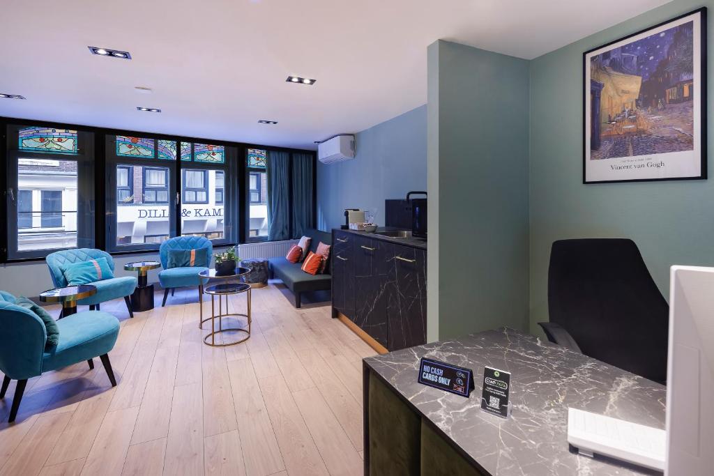 TV a/nebo společenská místnost v ubytování Ciao Papa Hotel Amsterdam Central Station