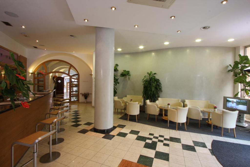 Posezení v ubytování Hotel Trinity