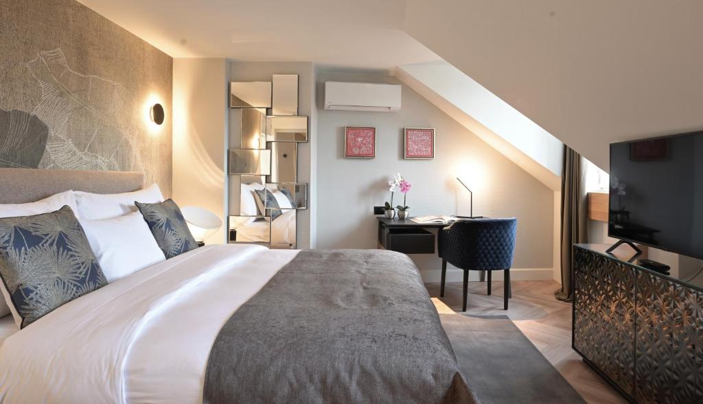 Vuode tai vuoteita majoituspaikassa Boutique Hotel Wellenberg