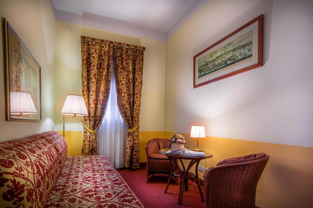 Postel nebo postele na pokoji v ubytování Palazzo Marcello Hotel Al Sole