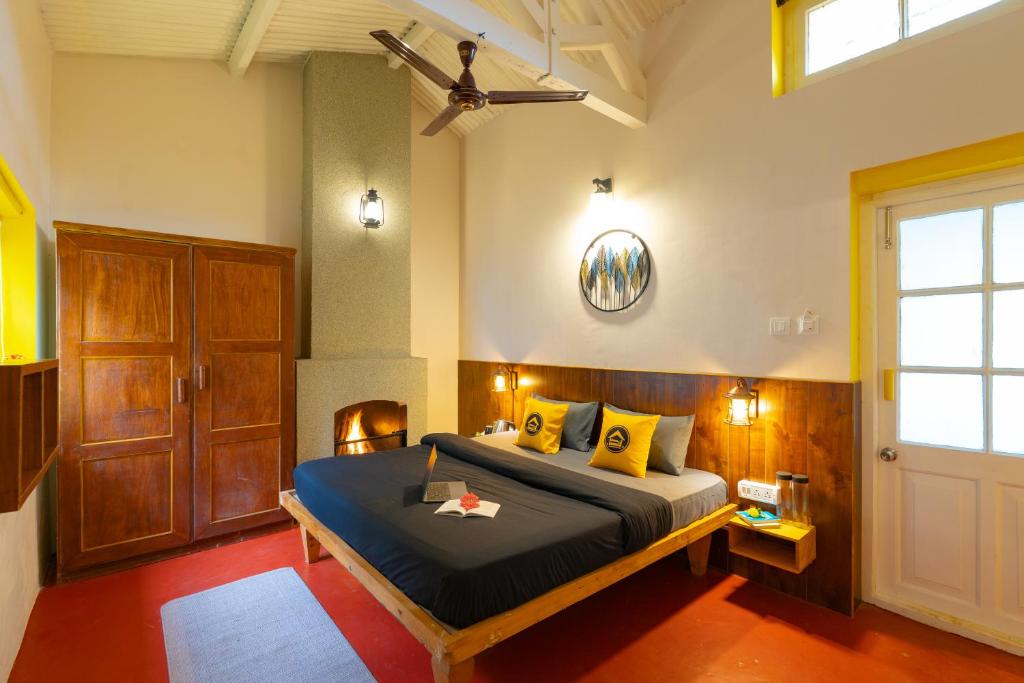 Postel nebo postele na pokoji v ubytování The Hosteller Ooty