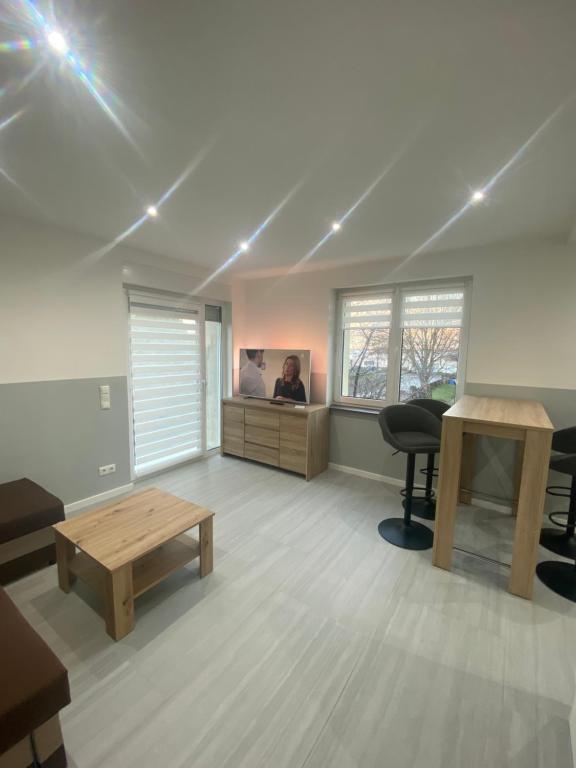 Posezení v ubytování Ferienwohnung H&M Immobilien - Geiseltalsee