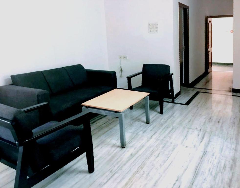 Posezení v ubytování Roshini Serviced Apartments