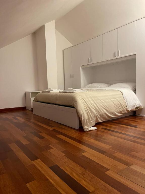 Łóżko lub łóżka w pokoju w obiekcie Agriturismo Ippocastano