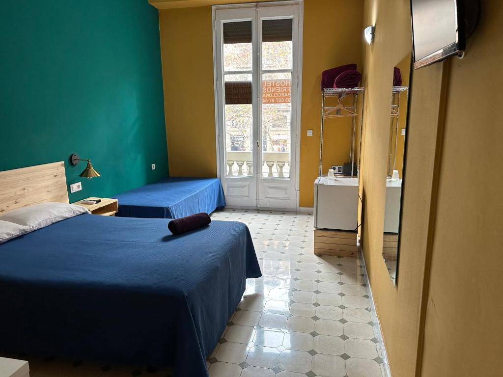 Postel nebo postele na pokoji v ubytování Hostel Friends Barcelona