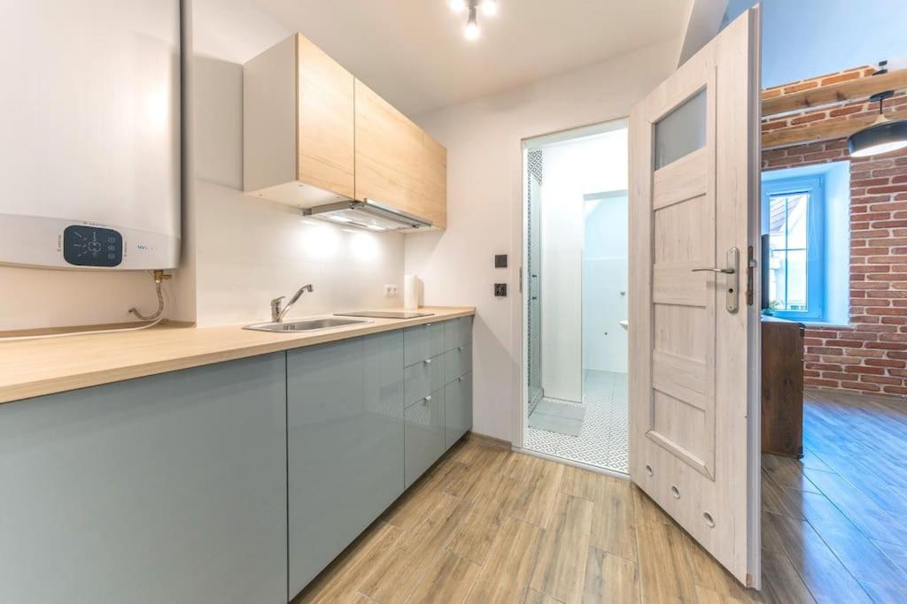 Kuchyňa alebo kuchynka v ubytovaní Hello Apartments Sw Ducha Loft for 4 guests