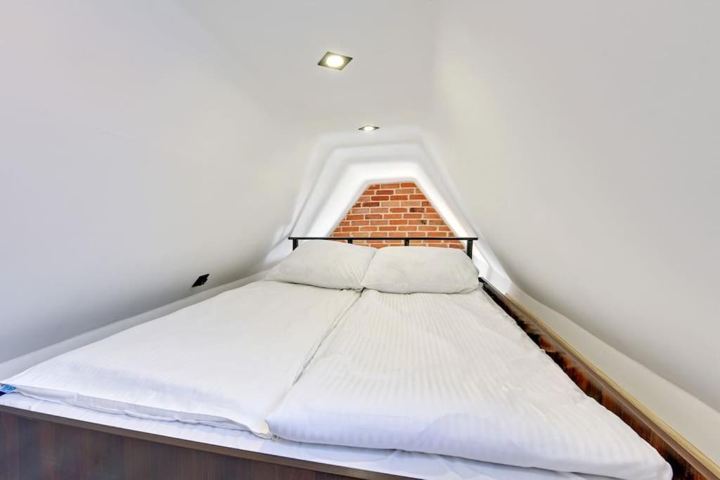 Posteľ alebo postele v izbe v ubytovaní Hello Apartments Sw Ducha Loft for 4 guests