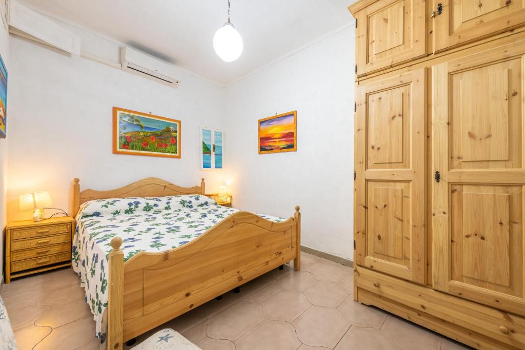 Postel nebo postele na pokoji v ubytování Casa San Fruttuoso