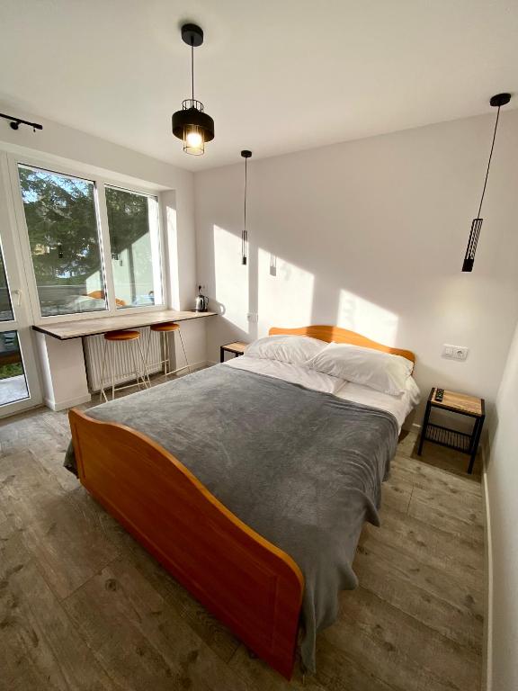 Postel nebo postele na pokoji v ubytování Willa Ametyst