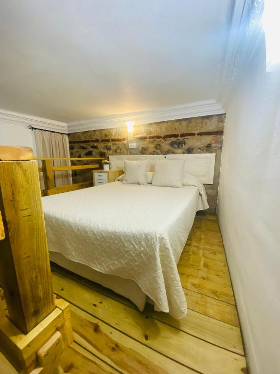 Posteľ alebo postele v izbe v ubytovaní Vacacionales Vegueta