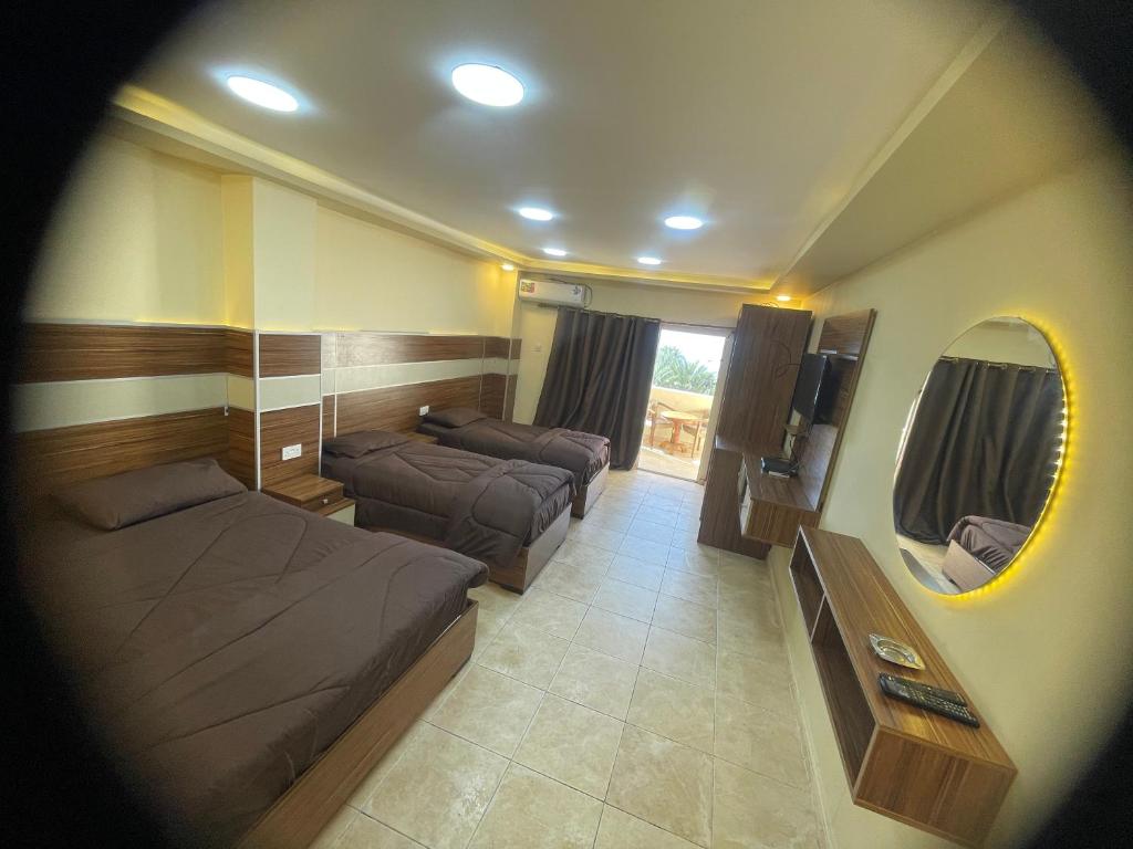 TV a/nebo společenská místnost v ubytování Al Deyafa Hotel
