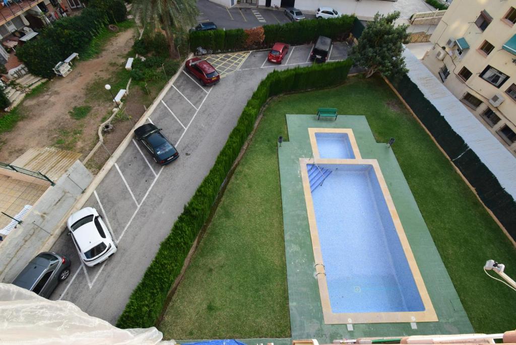 an overhead view of a swimming pool in a yard at DON PACO - Fincas Arena in Benidorm