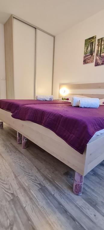 Posteľ alebo postele v izbe v ubytovaní Amna Home