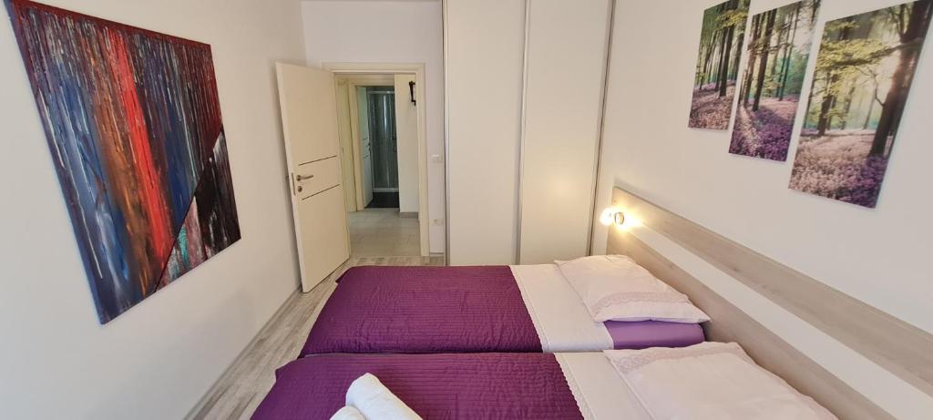 Posteľ alebo postele v izbe v ubytovaní Amna Home