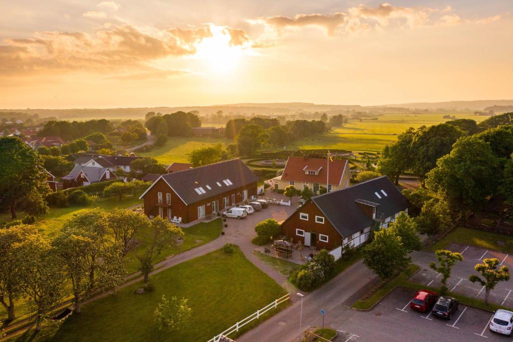 an aerial view of a village with houses at Halmstad Gårdshotell in Halmstad