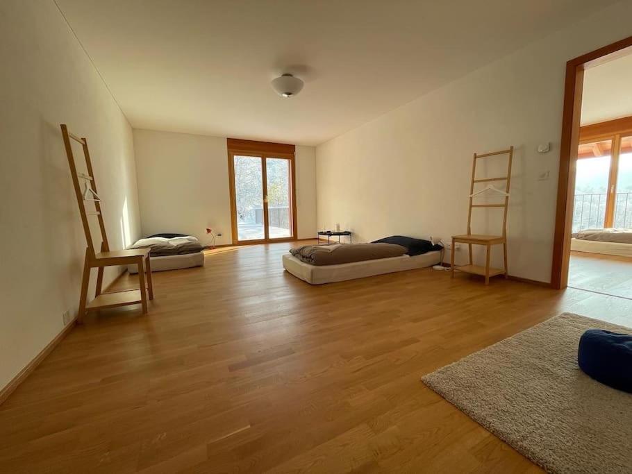 Postel nebo postele na pokoji v ubytování Wunderschönes Gästehaus mit grandioser Aussicht