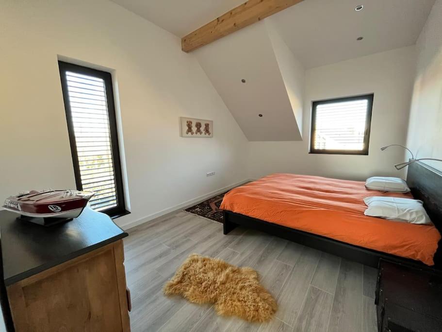 Postel nebo postele na pokoji v ubytování Maison petite Suisse luxembourg