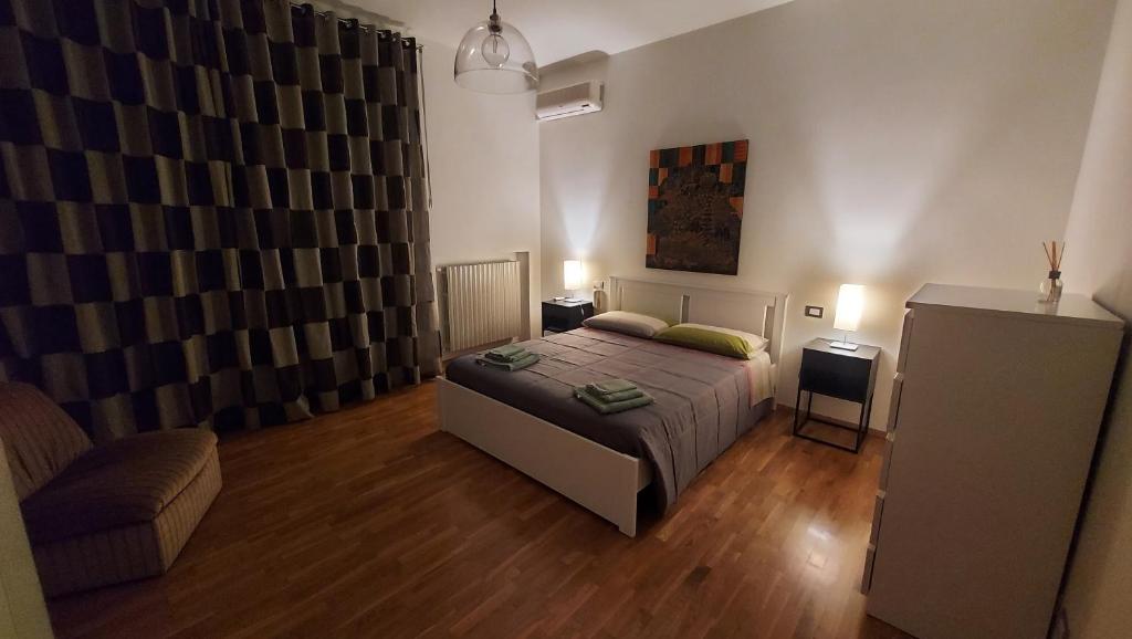 Postel nebo postele na pokoji v ubytování Le Strelizie