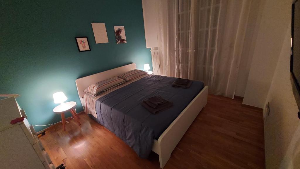 Postel nebo postele na pokoji v ubytování Le Strelizie