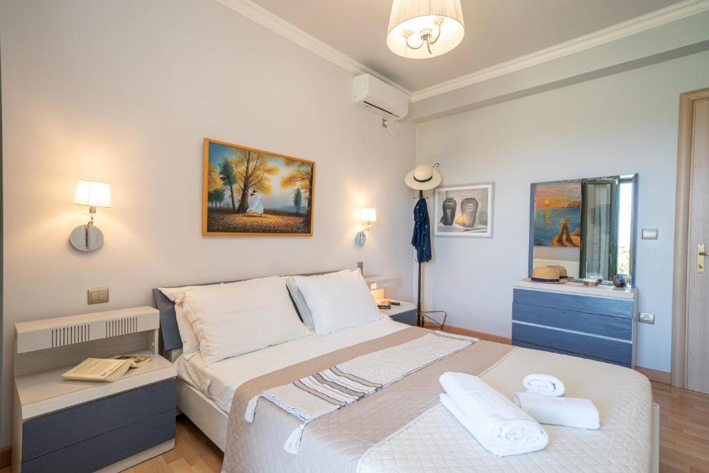 Postel nebo postele na pokoji v ubytování Meleva Home