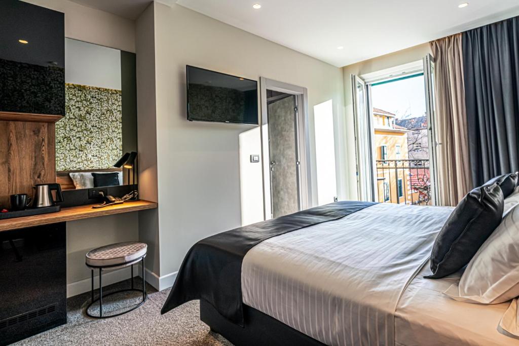 Postel nebo postele na pokoji v ubytování Calma Luxury Rooms