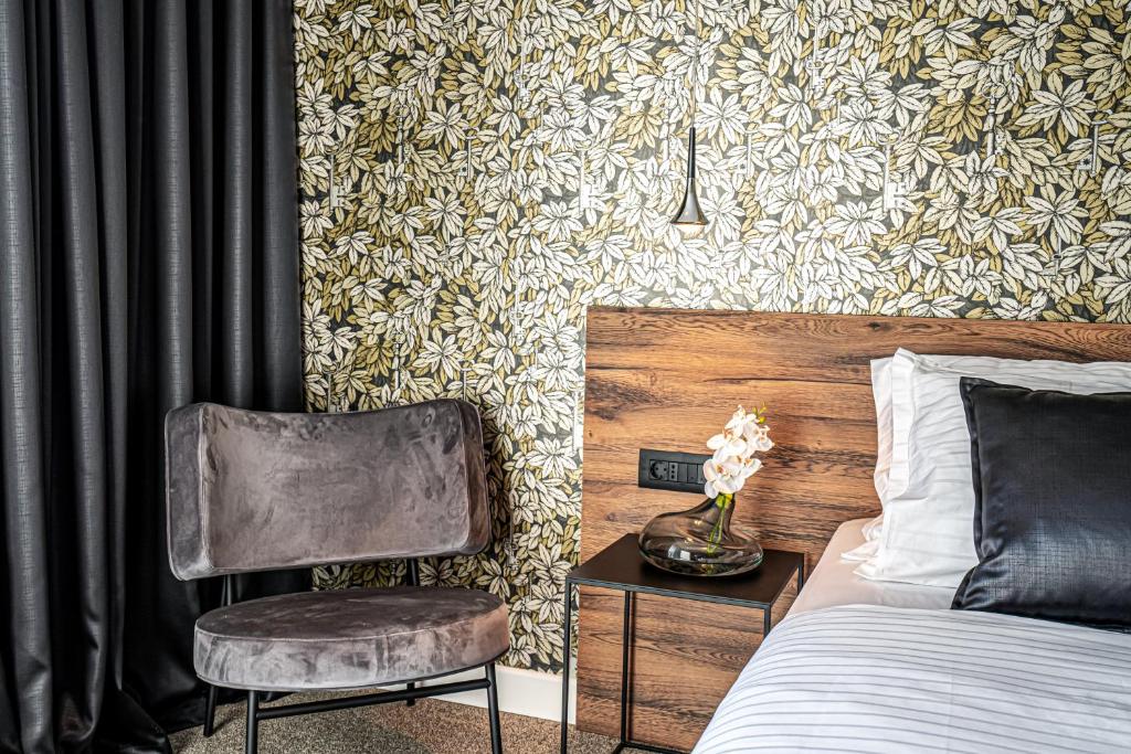 Postel nebo postele na pokoji v ubytování Calma Luxury Rooms