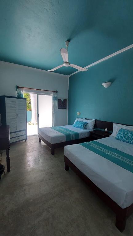 Letto o letti in una camera di Delphinus Inn