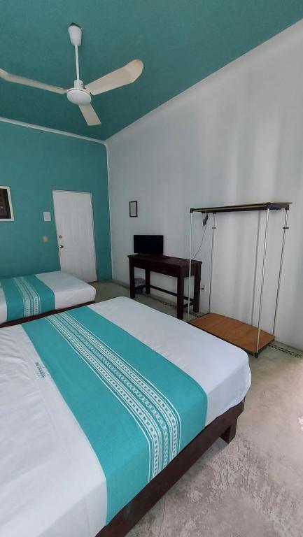 Letto o letti in una camera di Delphinus Inn
