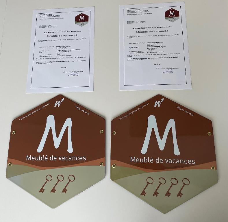 Certifikát, hodnocení, plakát nebo jiný dokument vystavený v ubytování Les Camuches de la banque