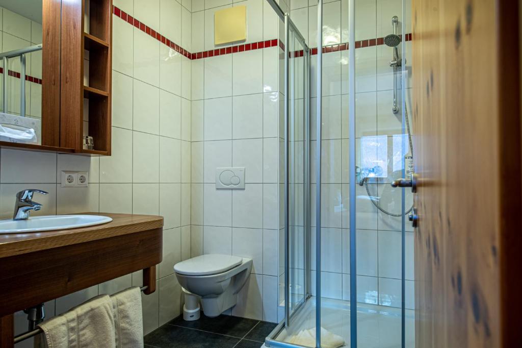 Koupelna v ubytování Hotel Raunig