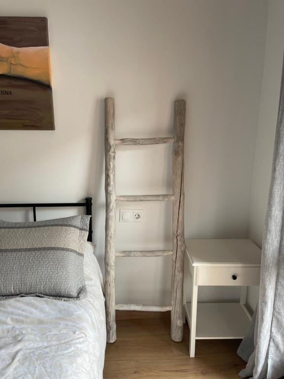 Postel nebo postele na pokoji v ubytování Piso Victoria