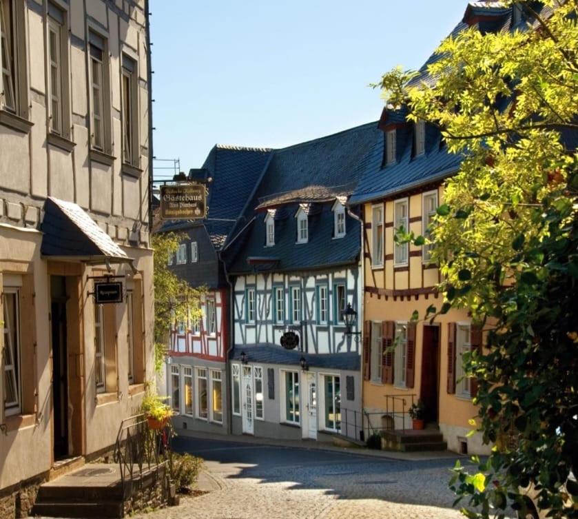 a group of buildings on a street in a town at Ferienwohnung Sternenstube in Völkenroth