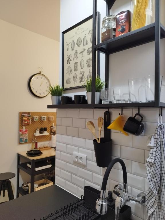 Kuchyňa alebo kuchynka v ubytovaní Apartment Vespa & Jacuzzi