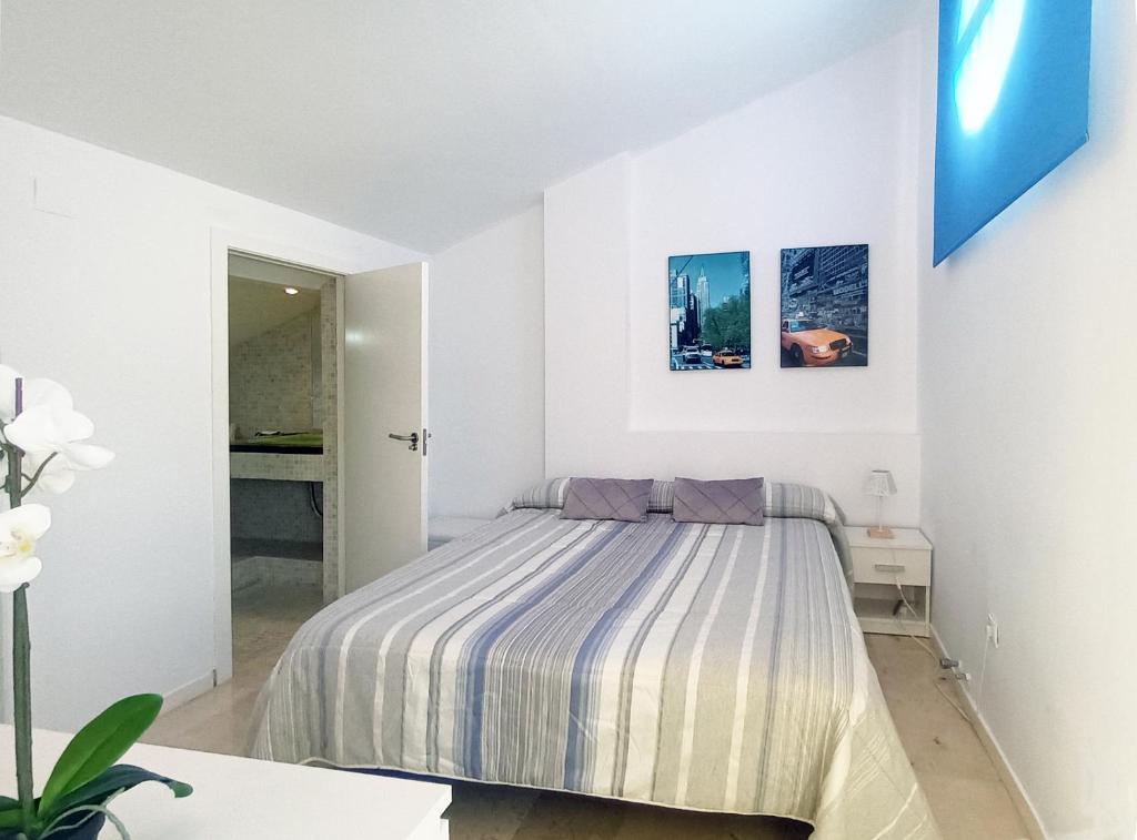Postel nebo postele na pokoji v ubytování Isla de Altea Beach Luxury House