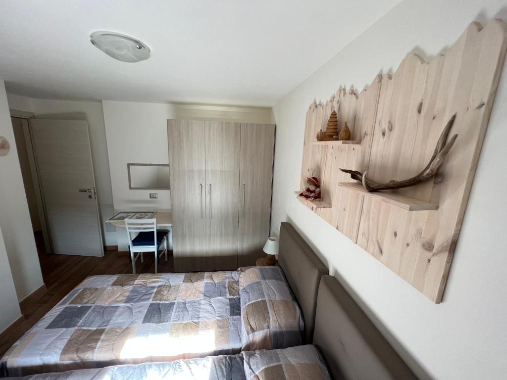 Postel nebo postele na pokoji v ubytování Appartamento Sara