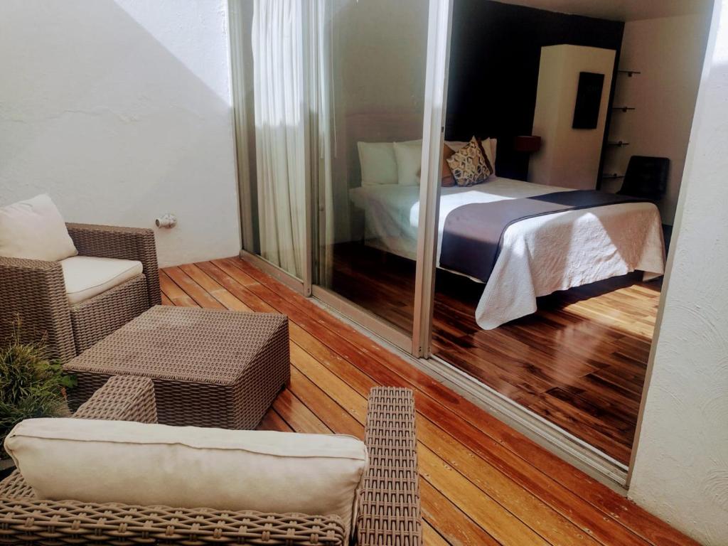 Postel nebo postele na pokoji v ubytování Hotel CLARUM 101
