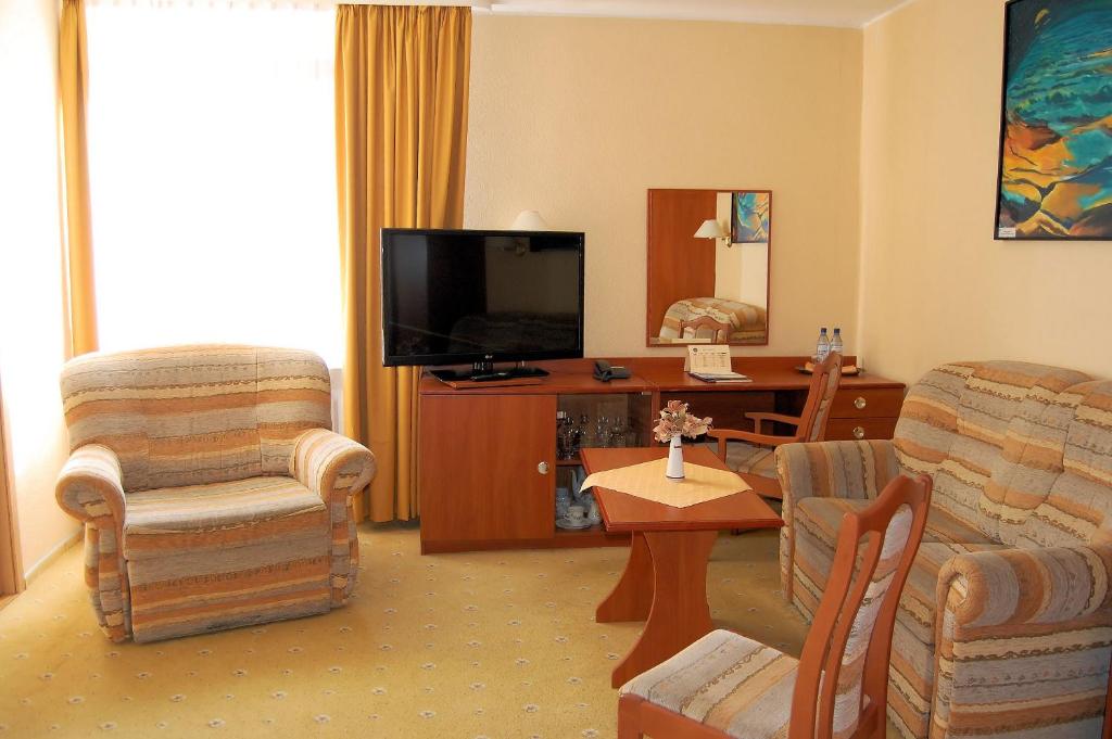 TV a/nebo společenská místnost v ubytování Hotel Wodnik